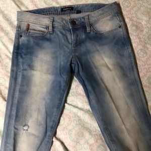 BEBE light wash faded skinny jeans